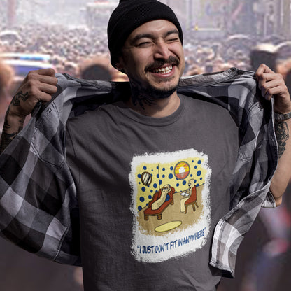 Man wearing a t-shirt with a graphic design and text, standing in a crowd. A funny non conformist t shirt for all you 'square pegs in round holes' out there. You are not alone. This unique design is ideal for anyone who thinks outside the box. Made from 100% organic ring-spun cotton, this sarcastic slogan t shirt is unisex, high-quality, super comfy, and best of all, eco-friendly.