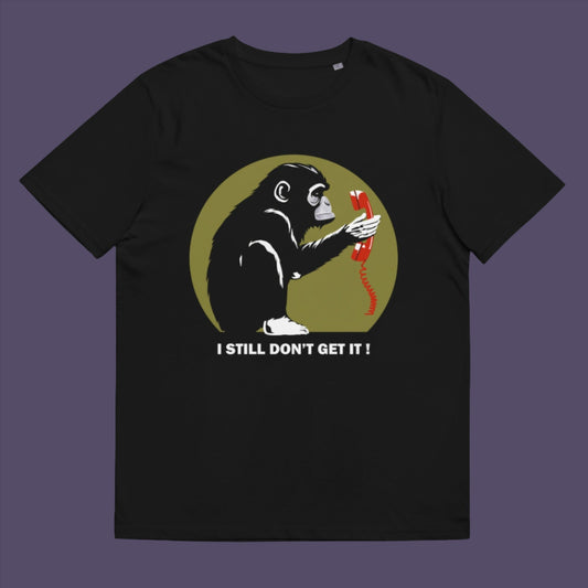 Black t-shirt. This anti smart phone abuse t-shirt design highlights the human obsession with smart phones and how strange it must look to an ape. An outsiders view of a world glued to mobile phones. Made from 100% organic ring-spun cotton, this anti mobile phone abuse t-shirt is unisex, high-quality, super comfy, and best of all, eco-friendly.