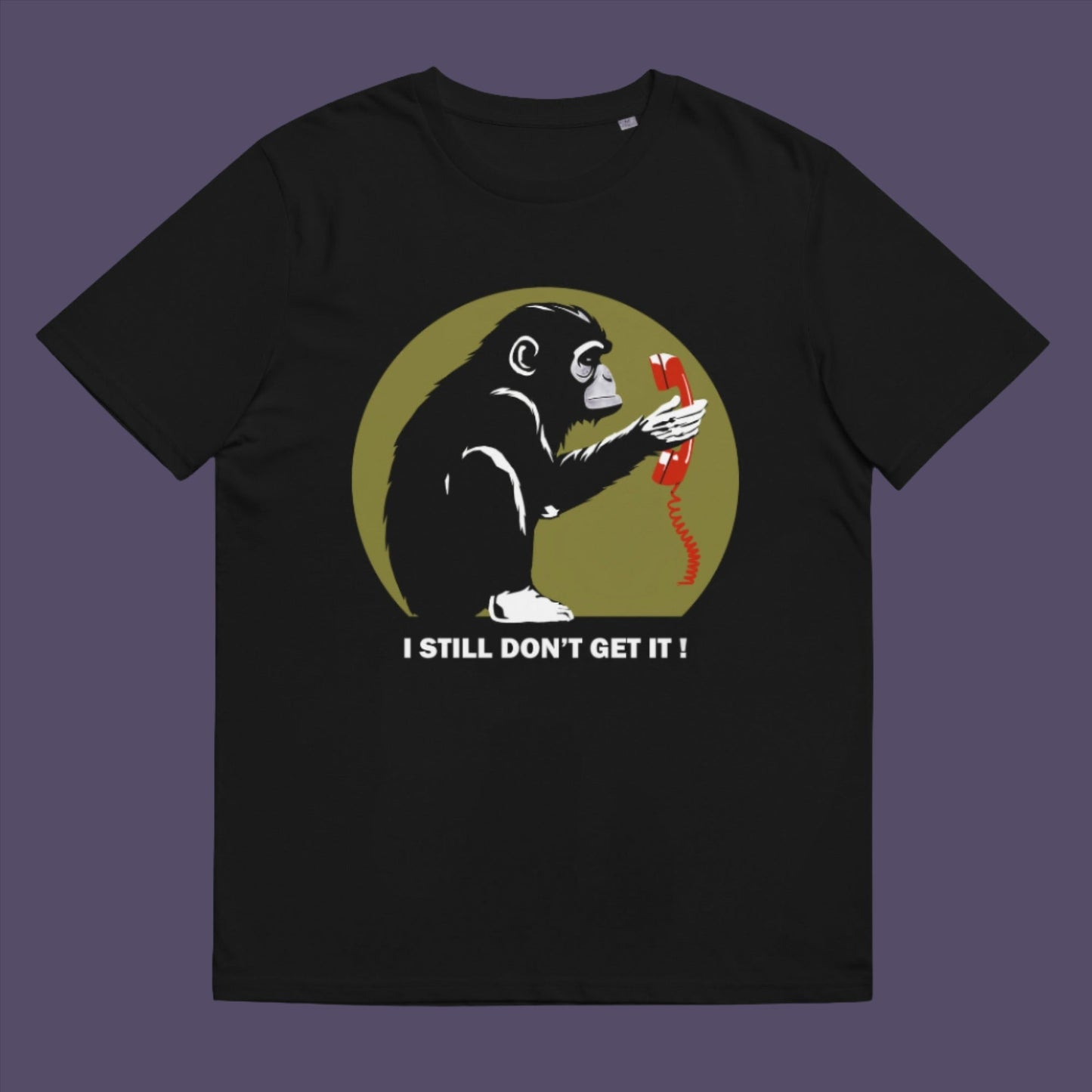 Black t-shirt. This satirical Banksy style stencil art t-shirt design highlights the human obsession with smart phones and how strange it must look to an ape. An outsiders view of a world glued to mobile phones. Made from 100% organic ring-spun cotton, this street art social awareness t-shirt is unisex, high-quality, super comfy, and best of all, eco-friendly.