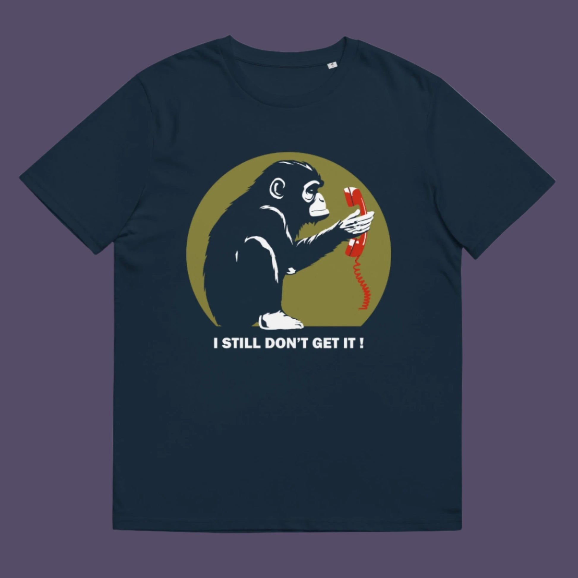 French navy t-shirt. This satirical Banksy style stencil art t-shirt design highlights the human obsession with smart phones and how strange it must look to an ape. An outsiders view of a world glued to mobile phones. Made from 100% organic ring-spun cotton, this street art social awareness t-shirt is unisex, high-quality, super comfy, and best of all, eco-friendly.