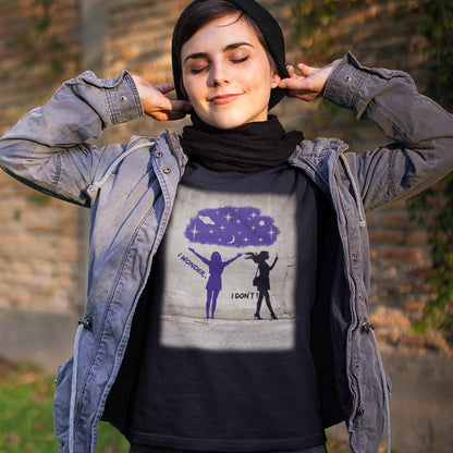 Person wearing a black t-shirt with a graphic design outdoors. This anti mobile phone abuse t shirt light heartedly pokes fun at people who never look up from their phone. If you believe letting a machine do most of your thinking for you will dull your imagination, this satirical design is for you. Made from 100% organic ring-spun cotton, these anti mobile phone abuse t shirts are unisex, high quality, super comfy, and best of all, eco-friendly.