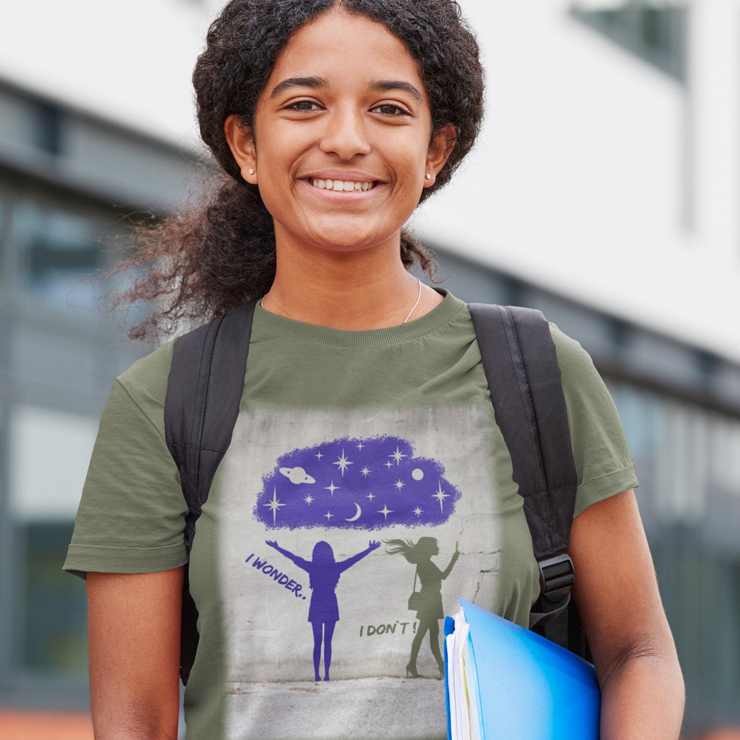 Young person wearing a t-shirt with a graphic design, standing outdoors. This anti mobile phone abuse t shirt light heartedly pokes fun at people who never look up from their phone. If you believe letting a machine do most of your thinking for you will dull your imagination, this satirical design is for you. Made from 100% organic ring-spun cotton, these anti mobile phone abuse t shirts are unisex, high quality, super comfy, and best of all, eco-friendly.