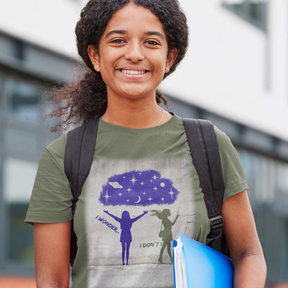 Young person wearing a t-shirt with a graphic design, standing outdoors. This anti mobile phone abuse t shirt light heartedly pokes fun at people who never look up from their phone. If you believe letting a machine do most of your thinking for you will dull your imagination, this satirical design is for you. Made from 100% organic ring-spun cotton, these anti mobile phone abuse t shirts are unisex, high quality, super comfy, and best of all, eco-friendly.
