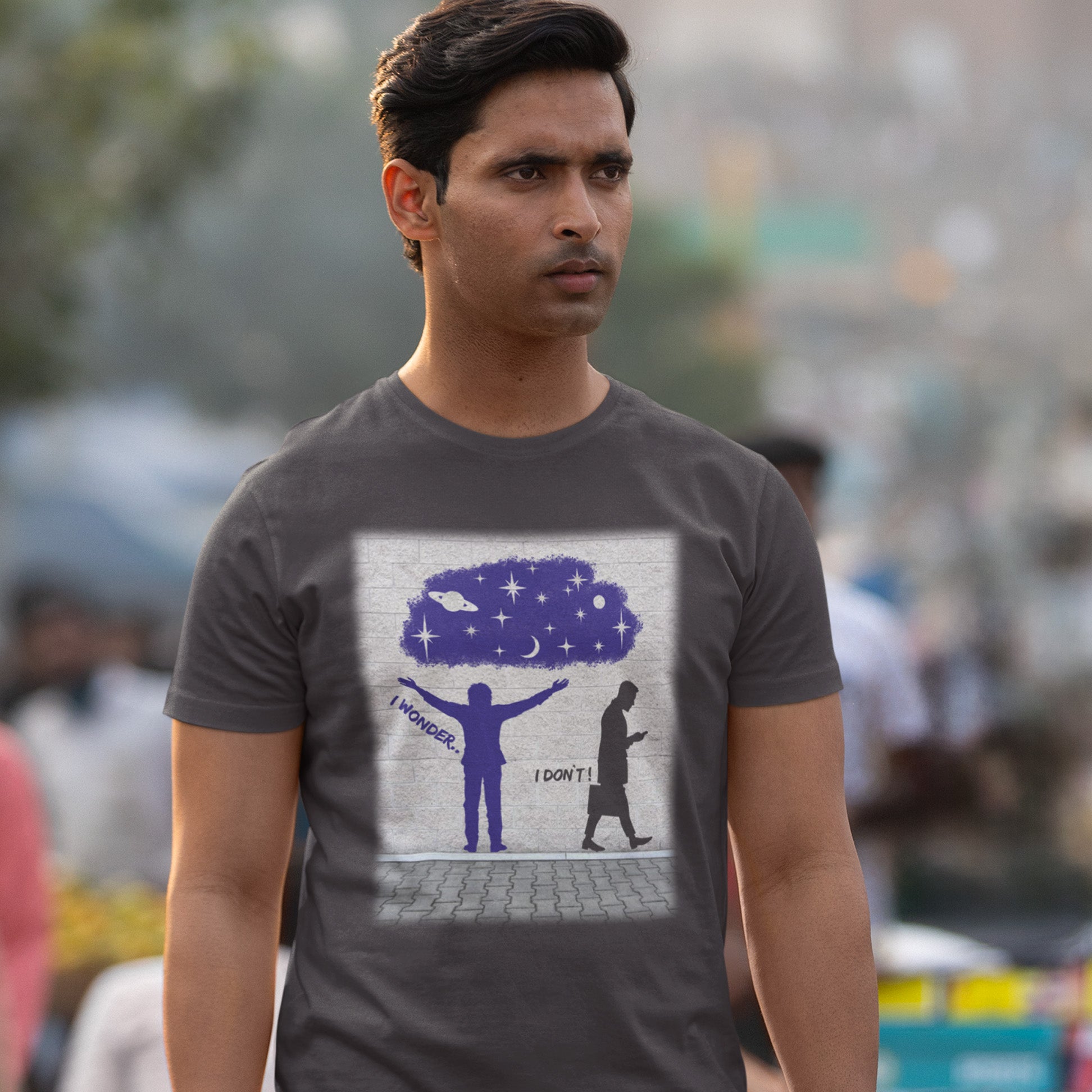 Man wearing a t-shirt with a graphic design of a person and another figure, with text and a tree. This anti mobile phone abuse t shirt light heartedly pokes fun at people who never look up from their phone. If you believe letting a machine do most of your thinking for you will dull your imagination, this satirical design is for you. Made from 100% organic ring-spun cotton, these anti mobile phone abuse t shirts are unisex, high quality, super comfy, and best of all, eco-friendly.