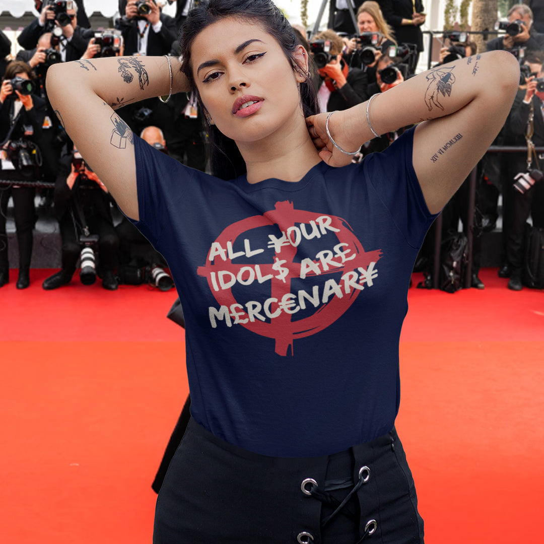 Person wearing a blue t-shirt with text on a red carpet. This broken society t shirt shows the dark side of capitalism. Why are we looking up to people that put money before integrity, what is it we admire, their bank accounts ? Are there any products that celebrities or sports personalities wouldn't sell ? Made from 100% organic ring-spun cotton, this anti capitalism t shirt is unisex, high-quality, super comfy, and best of all, eco-friendly.