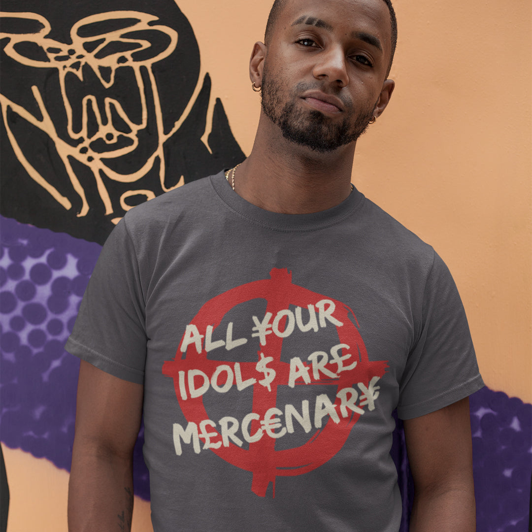 Man wearing a t-shirt with a graphic design and text, standing against a colourful abstract background. This broken society t shirt shows the dark side of capitalism. Why are we looking up to people that put money before integrity, what is it we admire, their bank accounts ? Are there any products that celebrities or sports personalities wouldn't sell ? Made from 100% organic ring-spun cotton, this anti capitalism t shirt is unisex, high-quality, super comfy, and best of all, eco-friendly.