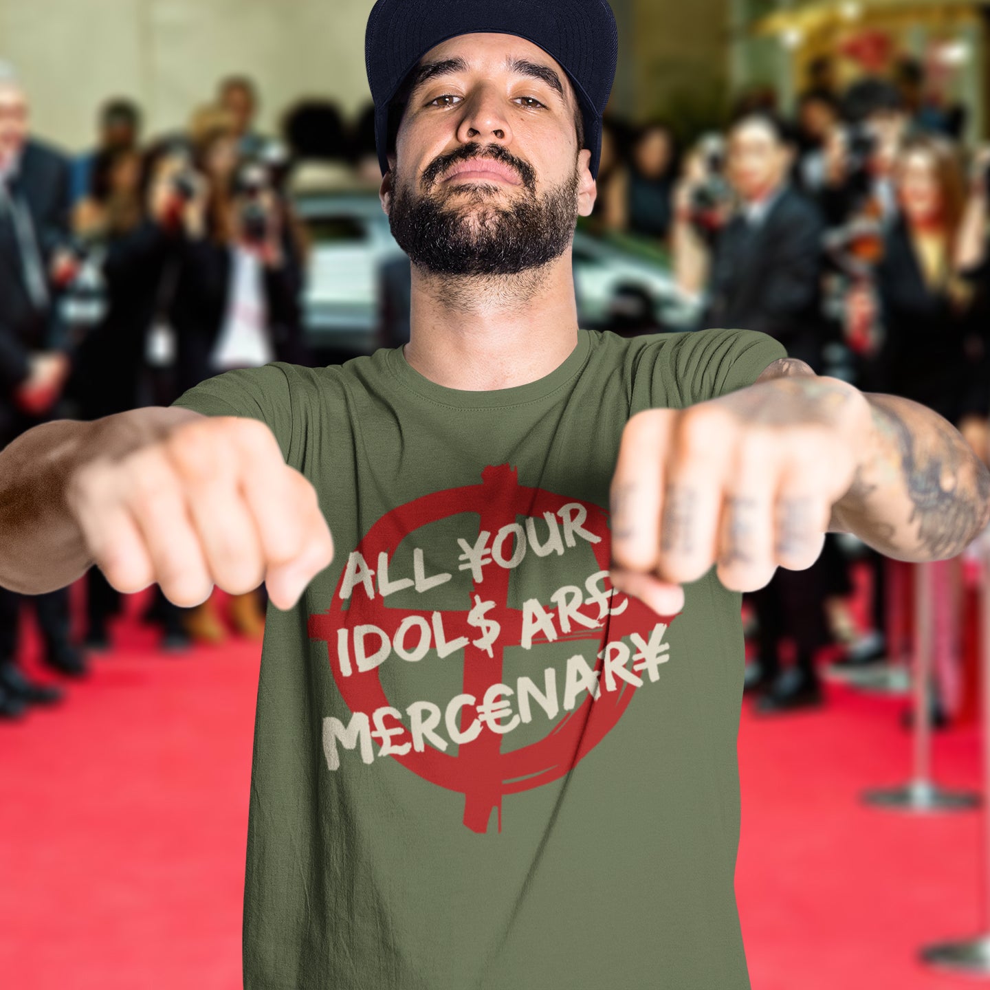 Man wearing a green t-shirt with a message on a red carpet. This broken society t shirt shows the dark side of capitalism. Why are we looking up to people that put money before integrity, what is it we admire, their bank accounts ? Are there any products that celebrities or sports personalities wouldn't sell ? Made from 100% organic ring-spun cotton, this anti capitalism t shirt is unisex, high-quality, super comfy, and best of all, eco-friendly.