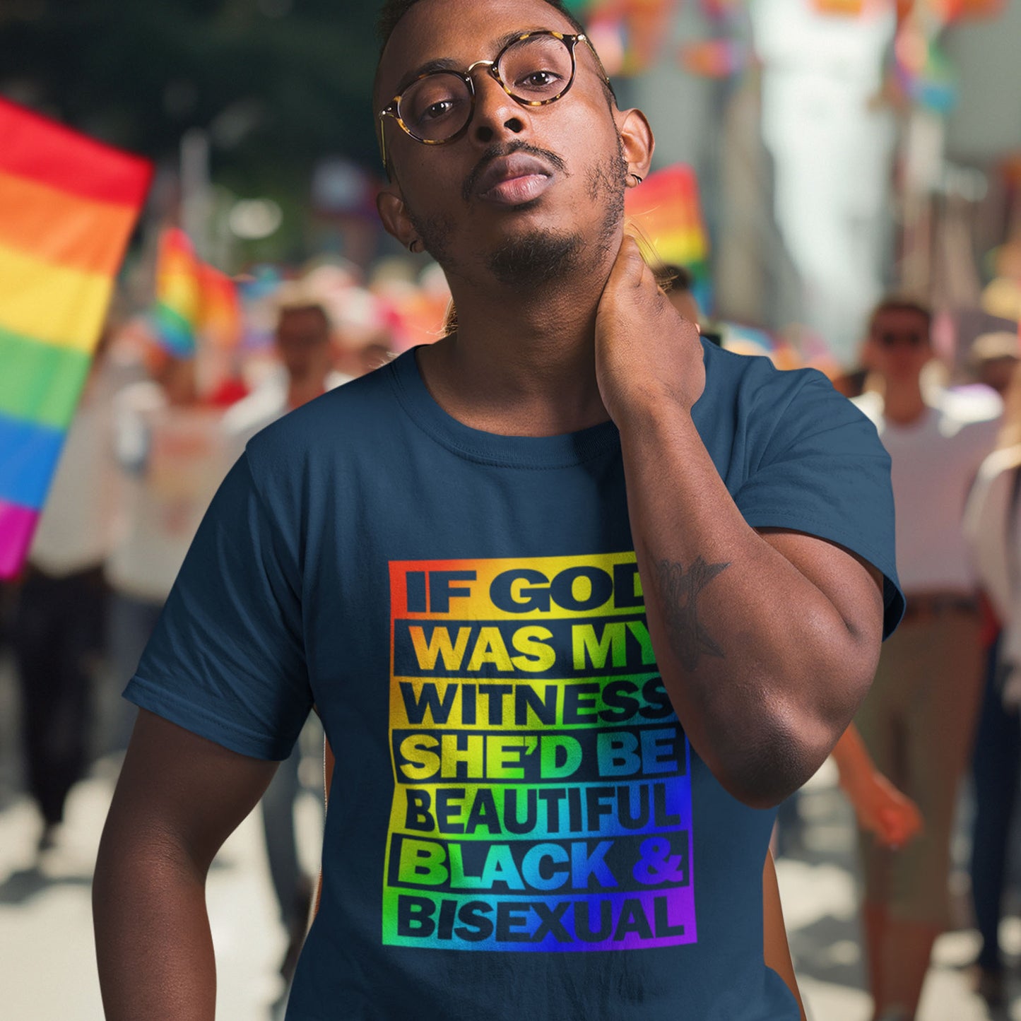Man wearing a colourful t-shirt with a message at a pride parade. A gender equality t shirt design. LGBTQ+ friendly and anti-racism in one. If there is a God she's probably more open minded than people give her credit for. Made from 100% organic ring-spun cotton, these gay slogan t shirts are unisex, high-quality, super comfy, and best of all, eco-friendly.