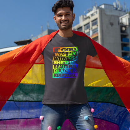 Person wearing a rainbow flag and a t-shirt with colourful text in an urban setting. A gender equality t shirt design. LGBTQ+ friendly and anti-racism in one. If there is a God she's probably more open minded than people give her credit for. Made from 100% organic ring-spun cotton, these gay slogan t shirts are unisex, high-quality, super comfy, and best of all, eco-friendly.