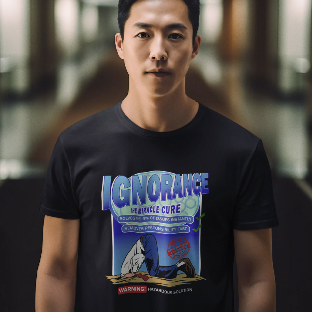 Person wearing a black t-shirt with a graphic design and text. This broken society t shirt comes in the form of a cleaning solution. A very satirical and sarcastic view of how ignorance has become the number one reaction to most of the problems facing modern society. Burying your head in the sand has always been a very popular but hazardous solution. Made from 100% organic ring-spun cotton, these social issues t shirts are unisex, high quality, super comfy, and best of all, eco-friendly.