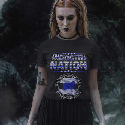 Person wearing a black t-shirt with 'Indoctrination' text and graphic design. A political t-shirt with satirical look at nationalism, an insight into a very dark future for any nation under a controlling government. Display your social awareness with this unique design. Made from 100% organic ring-spun cotton, this political t-shirt is unisex, high-quality, super comfy, and best of all, eco-friendly.