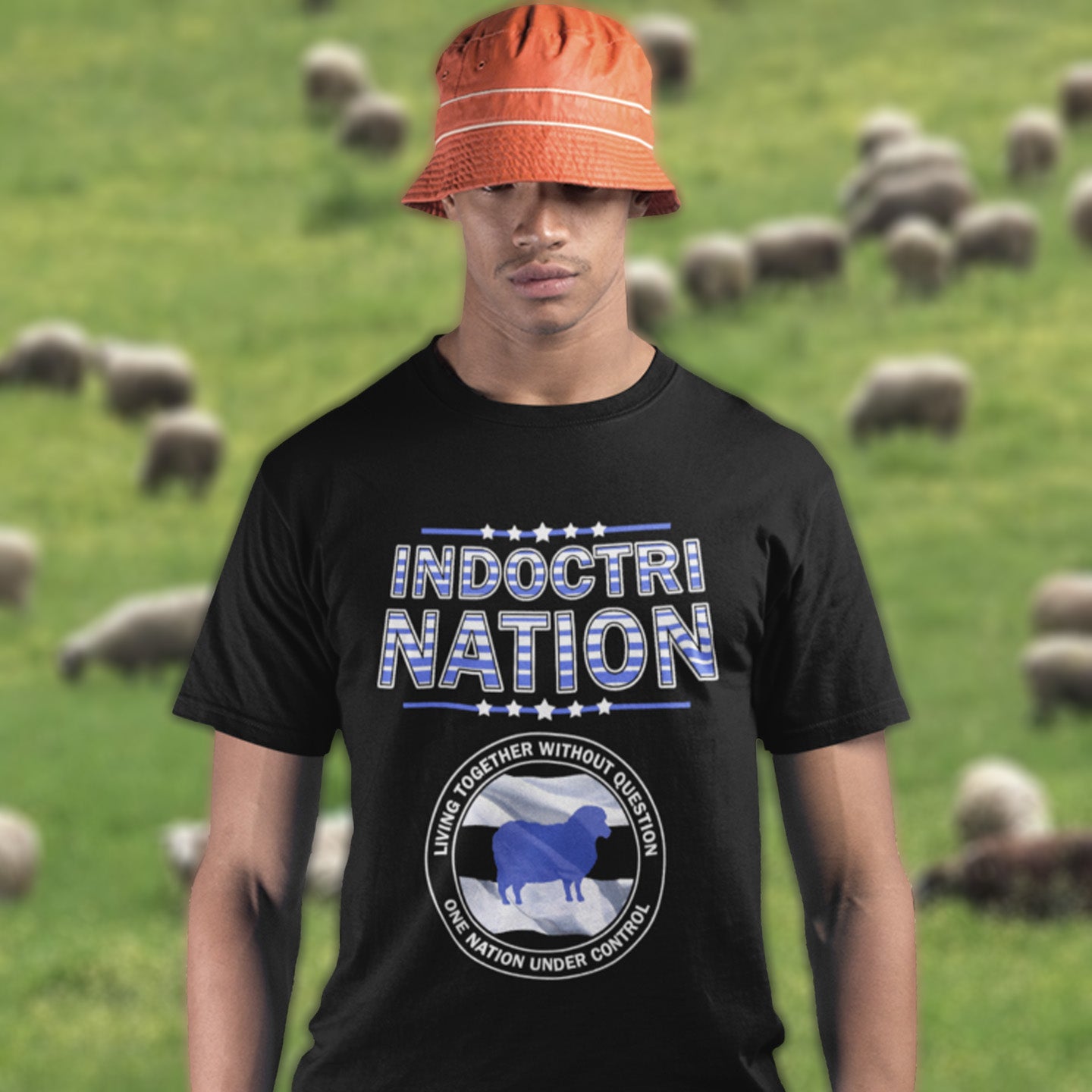 Person wearing a black t-shirt with 'Indoctrination' text and graphics, standing in front of a grassy field with sheep. A political t-shirt with satirical look at nationalism, an insight into a very dark future for any nation under a controlling government. Display your social awareness with this unique design. Made from 100% organic ring-spun cotton, this political t-shirt is unisex, high-quality, super comfy, and best of all, eco-friendly.
