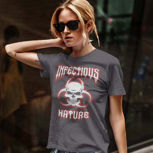 A woman in sunglasses, walking in the street, wearing an anthracite grey t-shirt with a skull and biohazard logo and "INFECTIOUS NATURE" text.