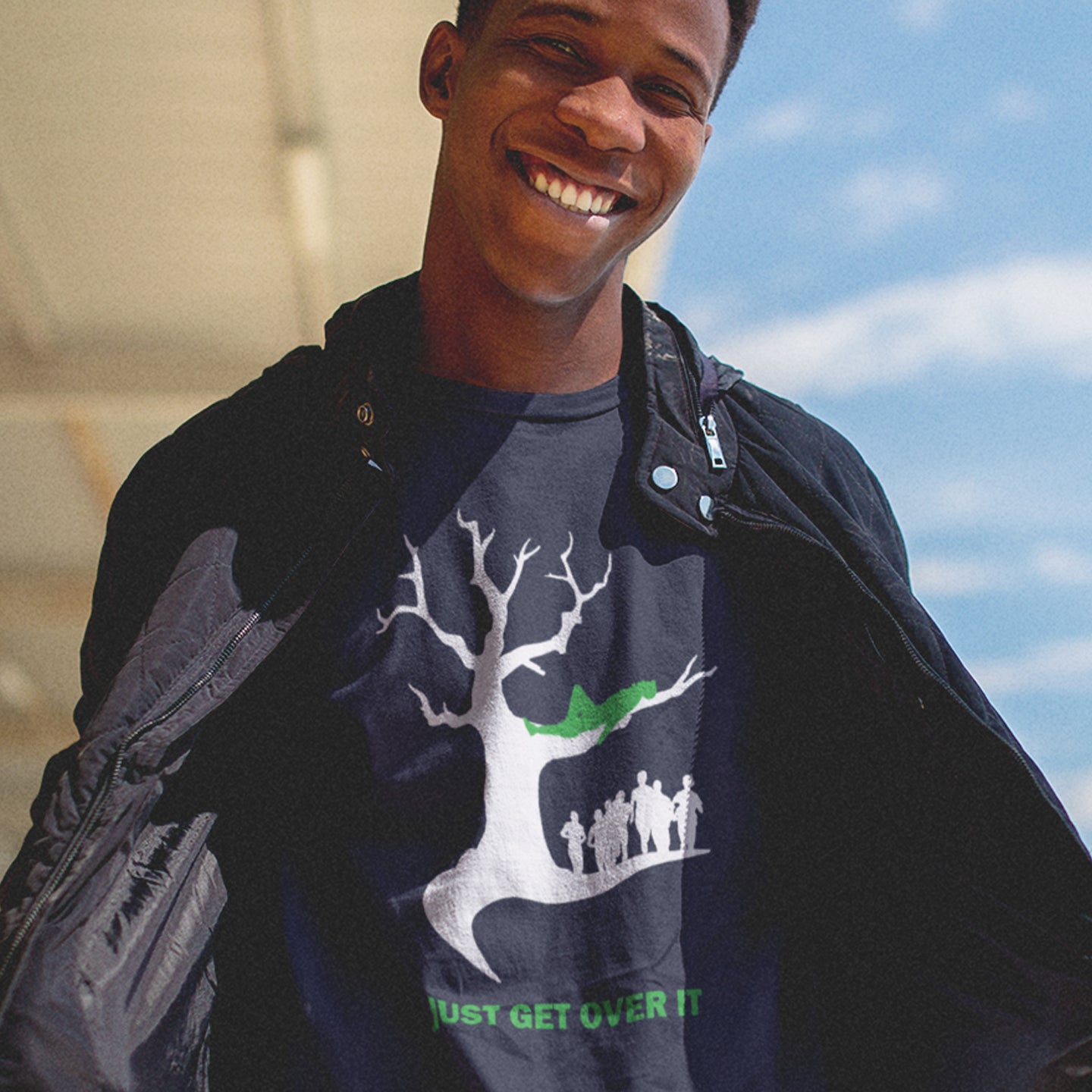 Person wearing a French navy t-shirt with a graphic design outdoors. This sarcastic motivational t-shirt design is for everyone who doesn't need a motivational one liner to find their pace of life. Made from 100% organic ring-spun cotton, this underground stencil art t-shirt is unisex, high-quality, super comfy, and best of all, eco-friendly.