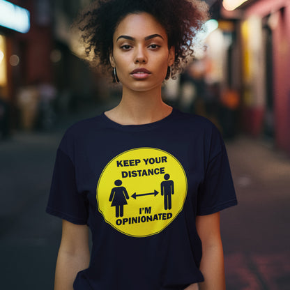 Person wearing a French navy t-shirt with a yellow graphic and text on a blurred street background. This opinionated t shirt design is a warning to people who speak before they think. It's best to warn them before they try to treat you like a clone. Made from 100% organic ring-spun cotton, this urban art t shirt is unisex, high-quality, super comfy, and best of all, eco-friendly.