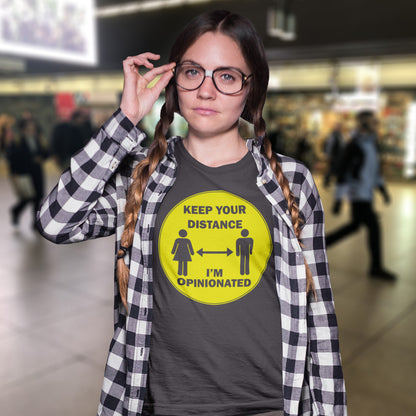 Woman wearing a t-shirt with a social distancing message in a public space. This opinionated t shirt design is a warning to people who speak before they think. It's best to warn them before they try to treat you like a clone. Made from 100% organic ring-spun cotton, this urban art t shirt is unisex, high-quality, super comfy, and best of all, eco-friendly.