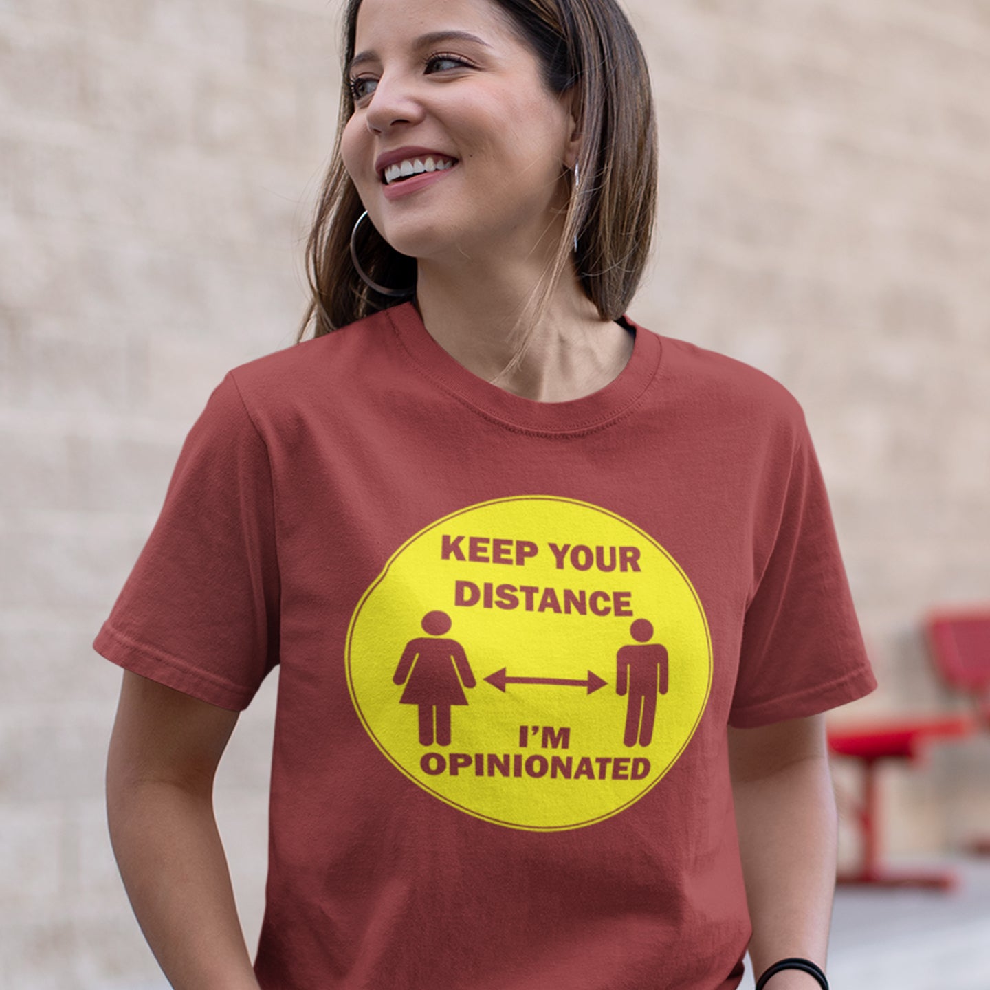 Person wearing a red t-shirt with a yellow graphic and text. This opinionated t shirt design is a warning to people who speak before they think. It's best to warn them before they try to treat you like a clone. Made from 100% organic ring-spun cotton, this urban art t shirt is unisex, high-quality, super comfy, and best of all, eco-friendly.
