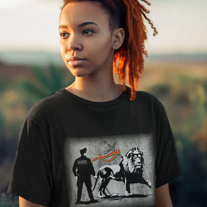 Person wearing a black t-shirt with a graphic design of a security guard and a lion. A stencil graffiti t shirt design mocking how much security we have in the western world, from a Rastafarian view point. Made from 100% organic ring-spun cotton, this urban art t shirt is unisex, high-quality, super comfy, and best of all, eco-friendly.