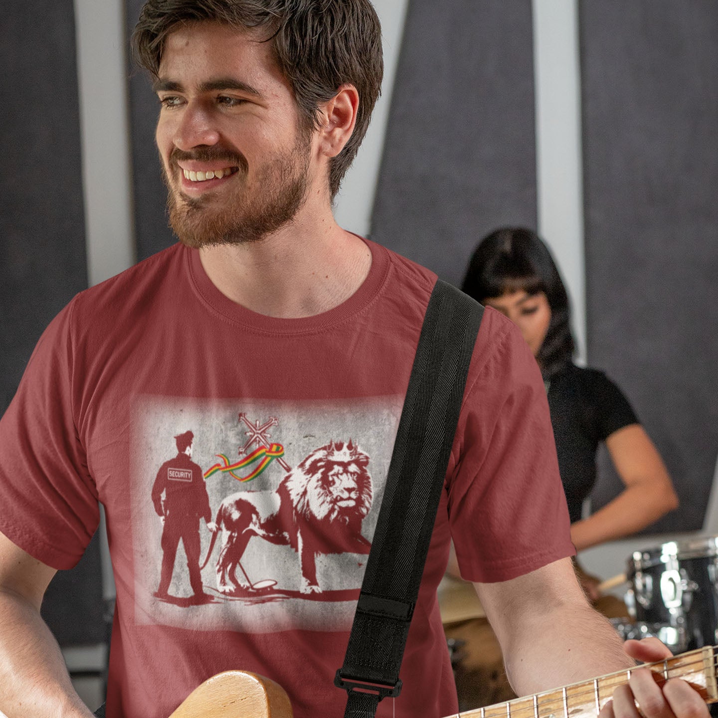 Man playing guitar with a band in the background. A stencil graffiti t shirt design mocking how much security we have in the western world, from a Rastafarian view point. Made from 100% organic ring-spun cotton, this urban art t shirt is unisex, high-quality, super comfy, and best of all, eco-friendly.