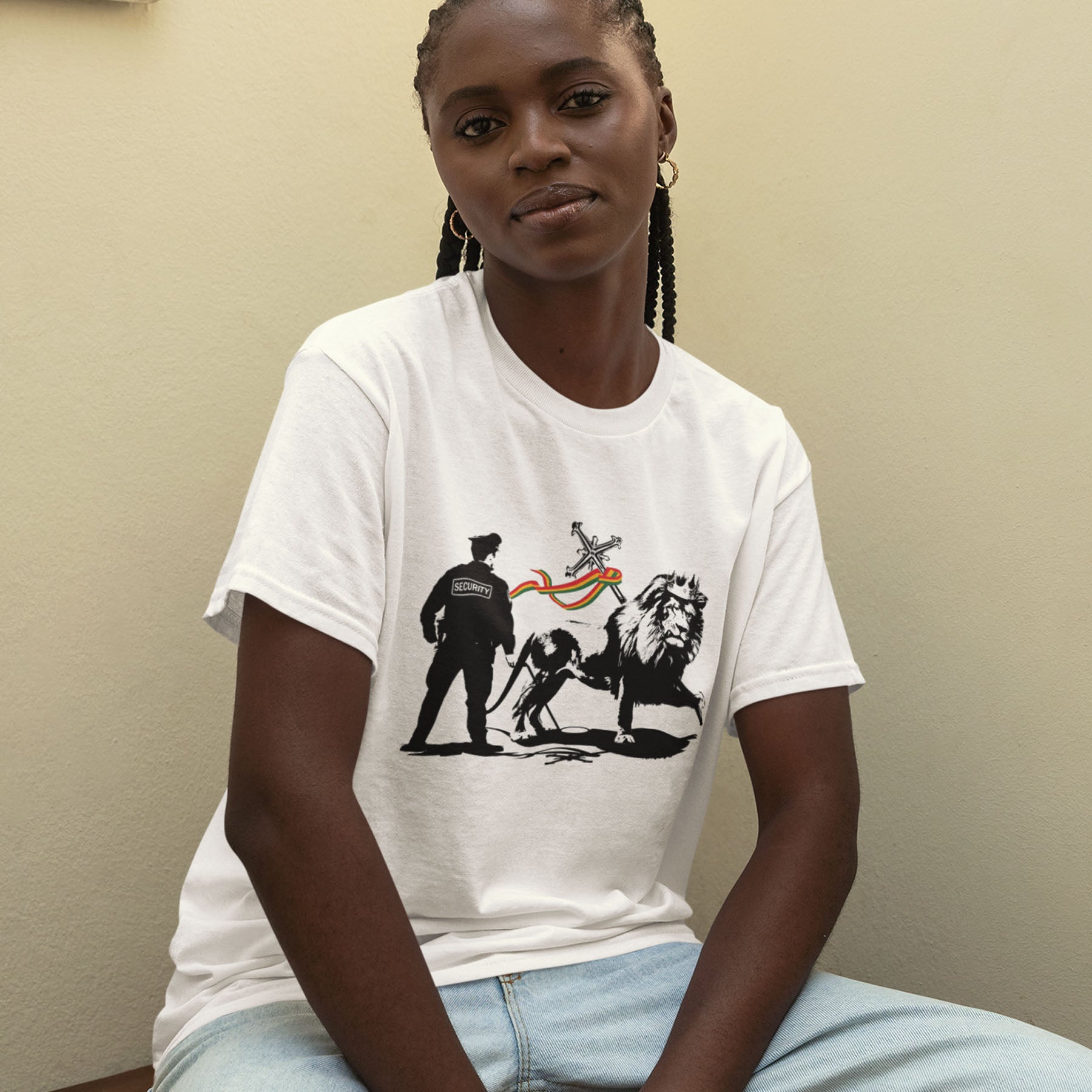 A mockery of how much security we have in the Western world from a Rastafarian view point.. Made from 100% organic ring-spun cotton, this unisex t-shirt is a total must-have. It's high-quality, super comfy, and best of all—eco-friendly.