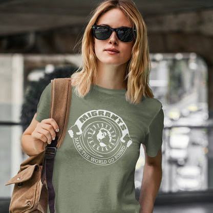 Woman wearing a khaki t-shirt with a graphic design and text, holding a brown bag. An anti racism t shirt showing support for migrants. If you believe that migrants help keep the gene pool fresh and encourage culture growth, or just believe there should be no borders, this migrant rights t shirt is for you. Made from 100% organic ring-spun cotton, this anti racism t shirt is unisex, high-quality, super comfy, and best of all, eco-friendly.