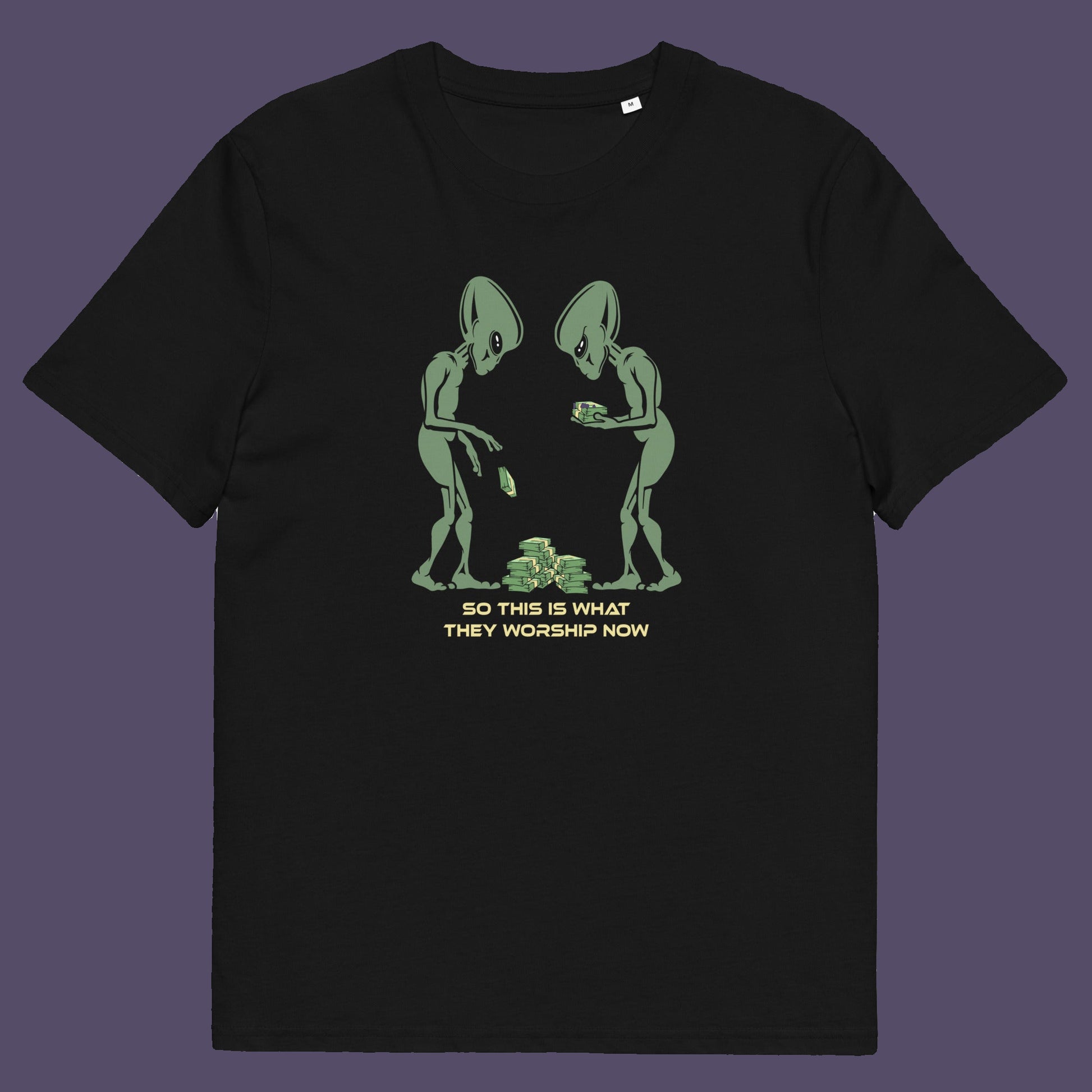 Black t-shirt. This funny anti-capitalism t-shirt is for alien lovers, and depicts the disappointment of a civilisation now overly obsessed with money and greed. Is it any wonder the aliens have given up on us. Made from 100% organic ring-spun cotton, this social awareness/alien t-shirt is unisex, high-quality, super comfy, and best of all, eco-friendly.