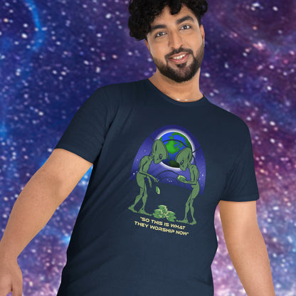 Person wearing a navy blue t-shirt with an alien and Earth graphic against a starry space background. This funny sci fi t shirt is for alien lovers and anti capitalist, and depicts the disappointment of a civilisation now overly obsessed with money and greed. Is it any wonder the aliens have given up on us. Made from 100% organic ring-spun cotton, this anti capitalist t shirt is unisex, high-quality, super comfy, and best of all, eco-friendly.