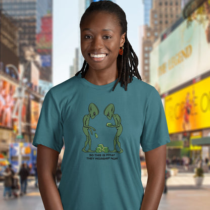 Person wearing a stargazer t-shirt with alien graphic in Times Square, New York. This funny alien t shirt is for alien lovers, and depicts the disappointment of a civilisation now overly obsessed with money and greed. Is it any wonder the aliens have given up on us. Made from 100% organic ring-spun cotton, this anti capitalist t shirt is unisex, high-quality, super comfy, and best of all, eco-friendly.