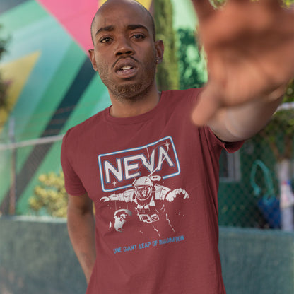 Man wearing a burgundy t shirt with an astronaut on it.