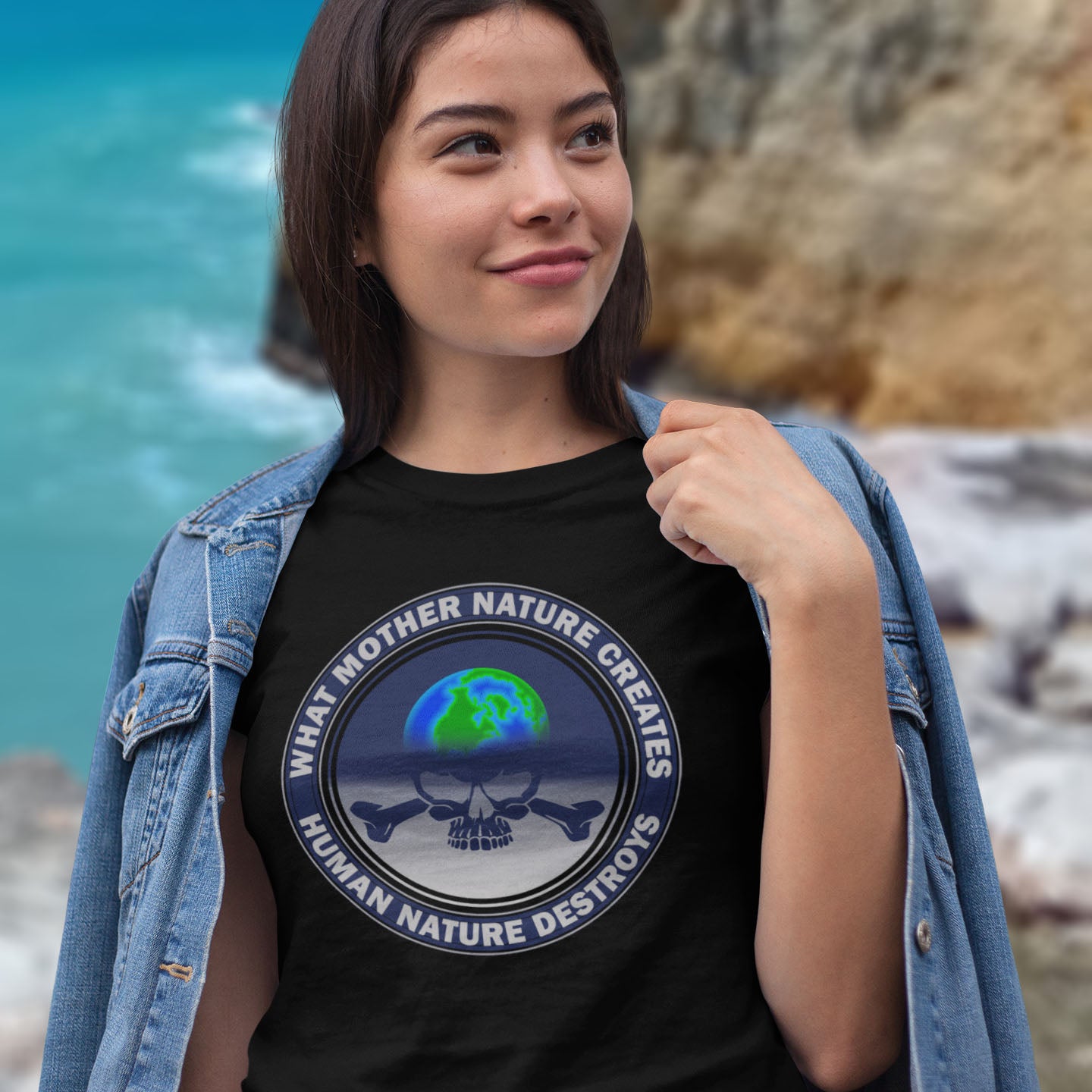 Person wearing a black t-shirt with a graphic design and text, standing outdoors with a natural background. A save the world t shirt. Mother nature vs. human nature. Environmental concern at it's rawest. A design for all eco warriors who would love to save the planet. Made from 100% organic ring-spun cotton, this save the planet t shirt design is unisex, high-quality, super comfy, and best of all, eco-friendly.