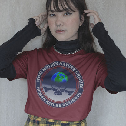 Person wearing a burgundy shirt with a graphic design and text. A save the world t shirt. Mother nature vs. human nature. Environmental concern at it's rawest. A design for all eco warriors who would love to save the planet. Made from 100% organic ring-spun cotton, this save the planet t shirt design is unisex, high-quality, super comfy, and best of all, eco-friendly.