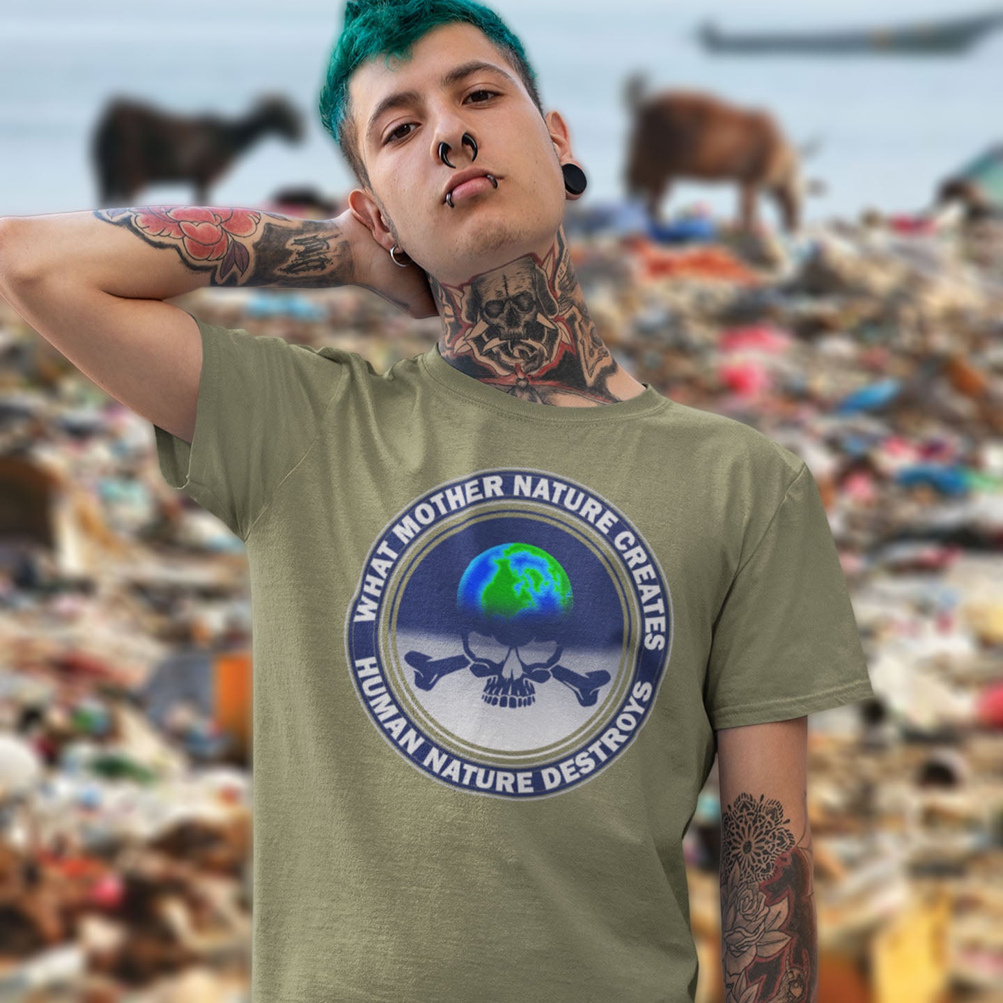 Person wearing a khaki t-shirt with a graphic design and text, standing in front of a blurred background. A save the world t shirt. Mother nature vs. human nature. Environmental concern at it's rawest. A design for all eco warriors who would love to save the planet. Made from 100% organic ring-spun cotton, this save the planet t shirt design is unisex, high-quality, super comfy, and best of all, eco-friendly.
