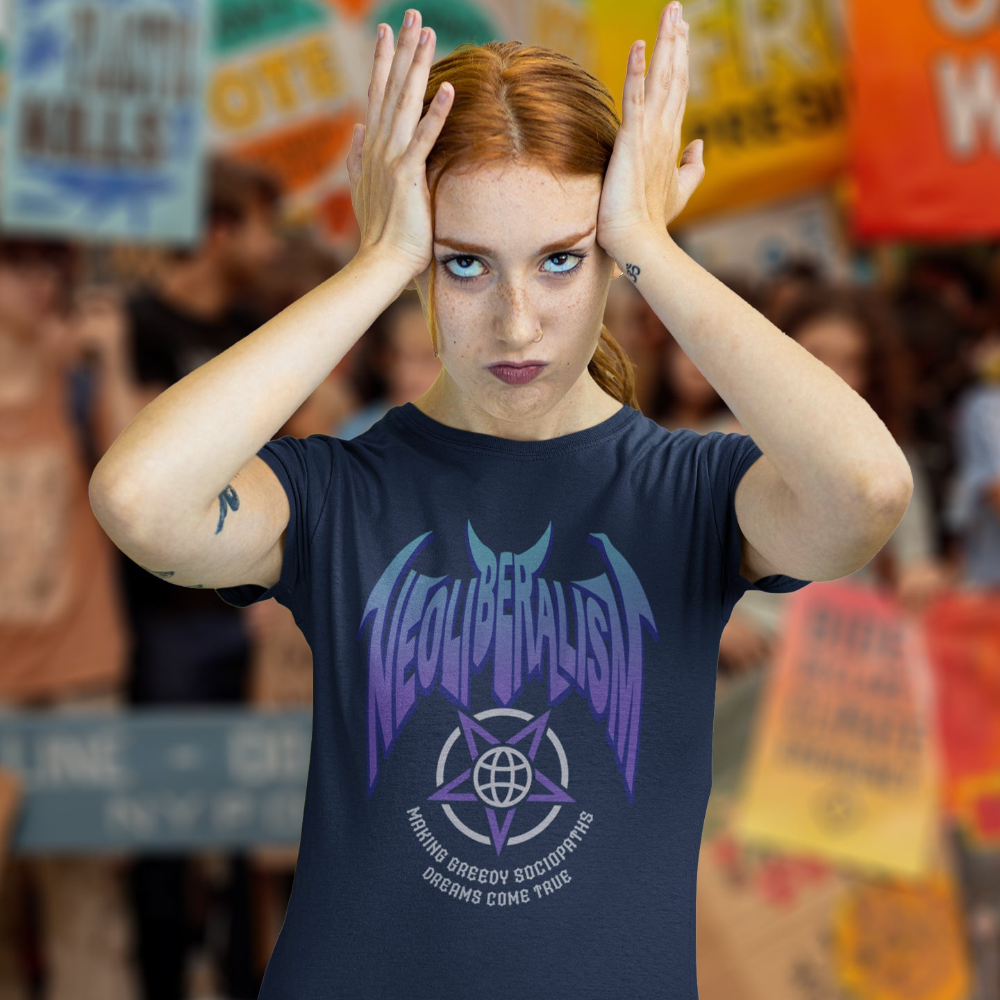 Woman at protest rally wearing a French navy 'neoliberalism' t shirt. An anti capitalism t shirt in a satanic rock band style. This design pays satirical homage to the most overlooked treat to a CIVILISED society. Neoliberalism, the fertile breeding ground for greed and corruption. Made from 100% organic ring-spun cotton, this counter culture t shirt is unisex, high quality, super comfy, and best of all, eco-friendly.