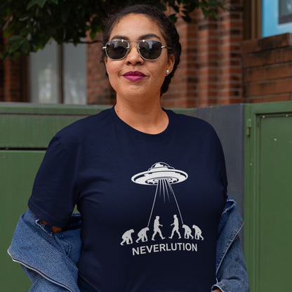 Person wearing a French navy blue sweatshirt with a UFO and evolution graphic, text 'NEVERLUTION'. An alien conspiracy theory t-shirt suggesting a different path of our evolution. Did evolution never really happen the way we are told, or is there a more intergalactic and colourful answer ? Made from 100% organic ring-spun cotton, this conspiracy theory t-shirt is unisex, high-quality, super comfy, and best of all, eco-friendly.