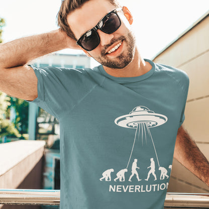 Man wearing a t-shirt with a UFO and evolution graphic, text 'NEVERLUTION'. An alien conspiracy theory t-shirt suggesting a different path of our evolution. Did evolution never really happen the way we are told, or is there a more intergalactic and colourful answer ? Made from 100% organic ring-spun cotton, this conspiracy theory t-shirt is unisex, high-quality, super comfy, and best of all, eco-friendly.