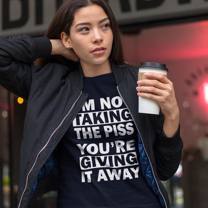 Person wearing a shirt with text and holding a coffee cup outdoors. A clever slogan t shirt design suggesting some people just set themselves up to be laughed at. Light hearted banter between friends , "No offence intended mate". Made from 100% organic ring-spun cotton, this sarcastic slogan t shirt is unisex, high-quality, super comfy, and best of all, eco-friendly.