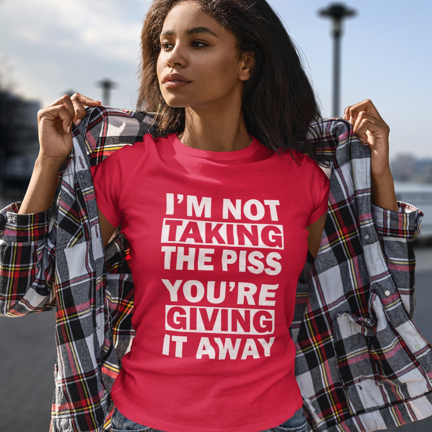 Person wearing a red t-shirt with white text outdoors. A clever slogan t shirt design suggesting some people just set themselves up to be laughed at. Light hearted banter between friends , "No offence intended mate". Made from 100% organic ring-spun cotton, this sarcastic slogan t shirt is unisex, high-quality, super comfy, and best of all, eco-friendly.