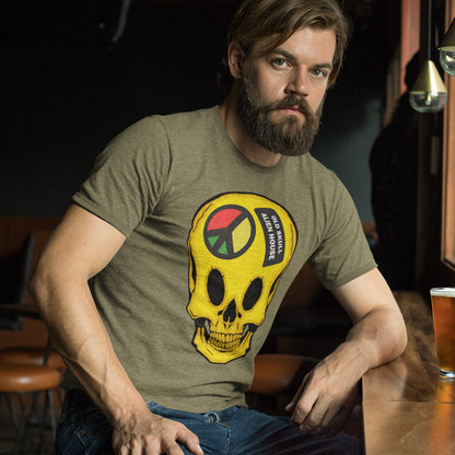 Man wearing a t-shirt with a skull design in a bar setting. A twisted 90's acid house t shirt design. You would be forgiven for having a fuzzy memory of the 90's if you were involved in the rave scene. An old skool acid house design for people who think outside the box and love aliens. Made from 100% organic ring-spun cotton, this funny 90's acid house t shirt is unisex, high-quality, super comfy, and best of all, eco-friendly.