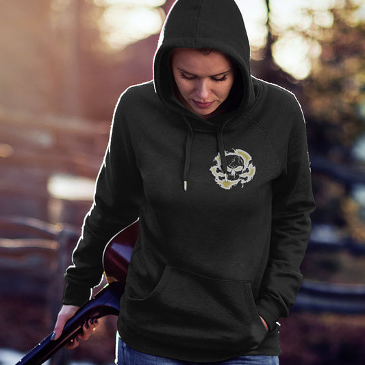 Person wearing a black hoodie with a logo, holding a guitar outdoors. An environmental concern hoodie for nature lovers who want to save the planet. Planet welfare should be something we can all agree on. Comfortable and practical. It's extra soft and has a convenient front pouch pocket. Made from organic cotton and recycled polyester, this environmental awareness hoodie is a great eco-friendly choice.
