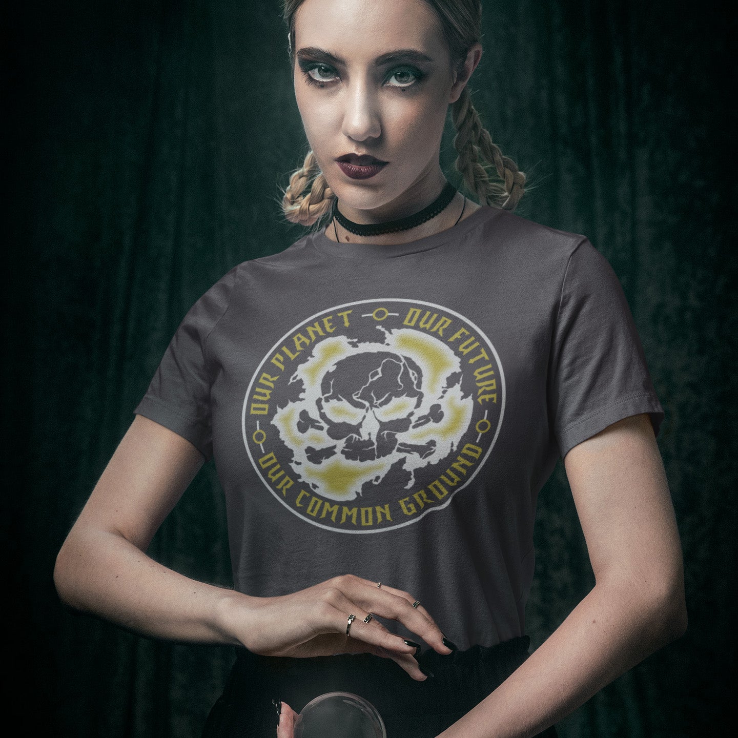 Person wearing an anthracite t-shirt with a graphic design on a dark background. A save the planet t shirt for nature lovers who have environmental concern. Planet welfare should be something we can all agree on. Made from 100% organic ring-spun cotton, this save the Earth t shirt is unisex, high-quality, super comfy, and best of all, eco-friendly. Grey design.