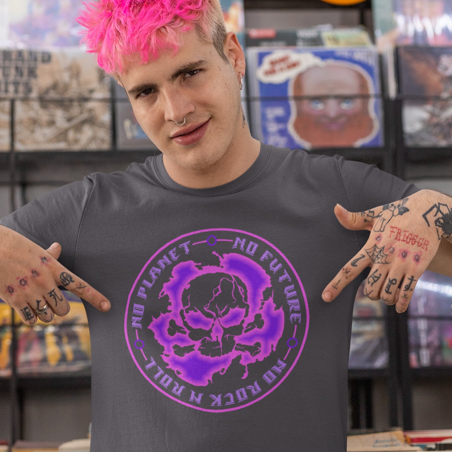 Person wearing an anthracite t-shirt with a purple graphic design in a store setting. A save the planet t shirt for nature lovers who have environmental concern. Planet welfare should be something we can all agree on. Made from 100% organic ring-spun cotton, this save the Earth t shirt is unisex, high-quality, super comfy, and best of all, eco-friendly. Pink design.