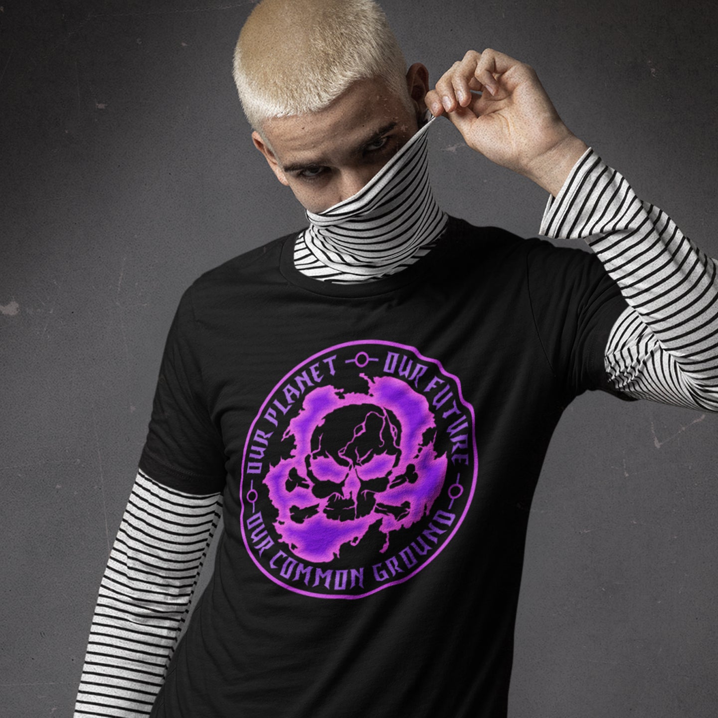 Person wearing a black t-shirt with a purple graphic design on a grey background. A save the planet t shirt for nature lovers who have environmental concern. Planet welfare should be something we can all agree on. Made from 100% organic ring-spun cotton, this save the Earth t shirt is unisex, high-quality, super comfy, and best of all, eco-friendly. Pink design.