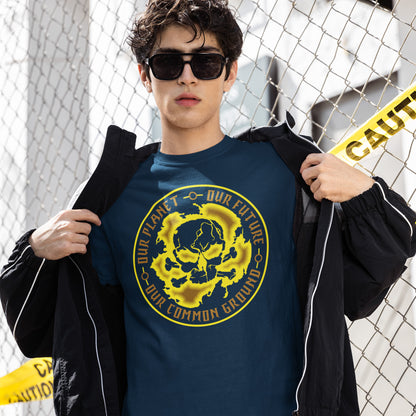 Person wearing a blue t-shirt with a yellow graphic design in front of a chain-link fence. An environmental concern t-shirt for nature lovers who want to save the planet. Planet welfare should be something we can all agree on. Made from 100% organic ring-spun cotton, this climate concern t-shirt is unisex, high-quality, super comfy, and best of all, eco-friendly. yellow design.