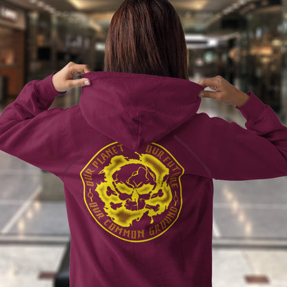 Person wearing a burgundy hoodie with a yellow graphic and text on the back, standing in an indoor setting. A save the Earth hoodie in a yellow design, for nature lovers who have environmental concern. Planet welfare should be something we can all agree on. Comfortable and practical. It's extra soft and has a convenient front pouch pocket. Made from organic cotton and recycled polyester, this save the world hoodie is a great eco-friendly choice.