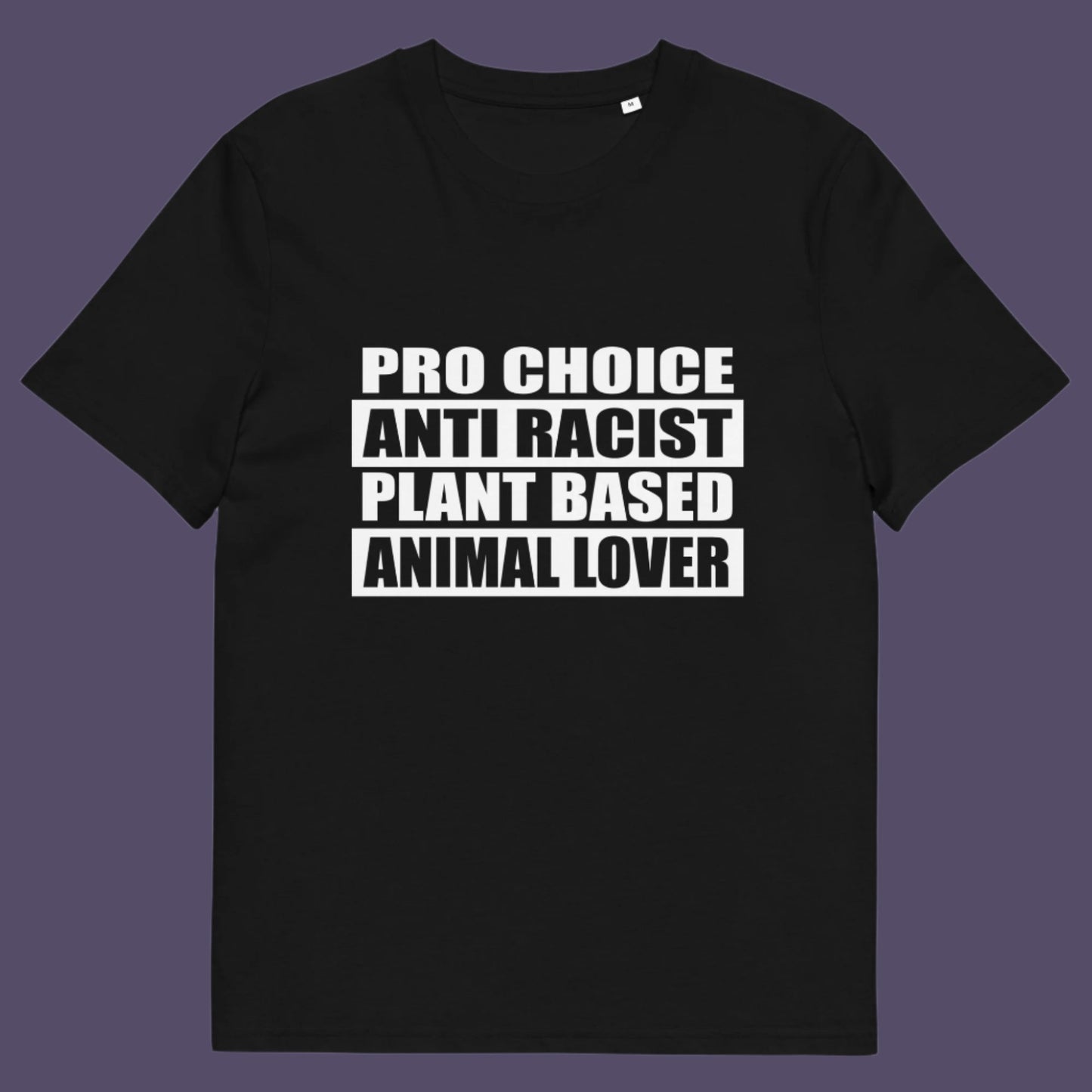 Black t-shirt. A plant based t-shirt design intertwined with Pro Choice, Anti Racism, and Animal loving, characteristics that often go together. Made from 100% organic ring-spun cotton, this vegan t-shirt is unisex, high-quality, super comfy, and best of all, eco-friendly.