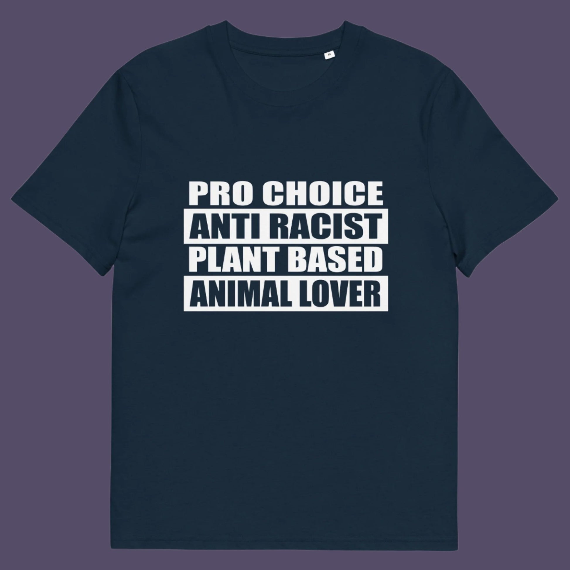 French navy t-shirt. A plant based t-shirt design intertwined with Pro Choice, Anti Racism, and Animal loving, characteristics that often go together. Made from 100% organic ring-spun cotton, this vegan t-shirt is unisex, high-quality, super comfy, and best of all, eco-friendly.