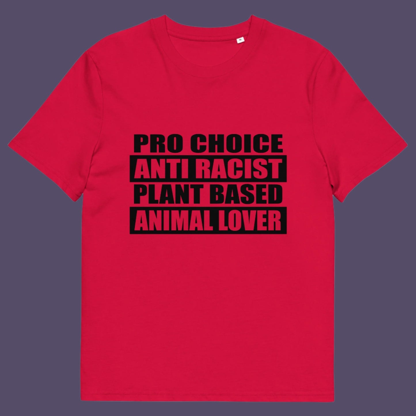 Red t-shirt. A plant based t-shirt design intertwined with Pro Choice, Anti Racism, and Animal loving, characteristics that often go together. Made from 100% organic ring-spun cotton, this vegan t-shirt is unisex, high-quality, super comfy, and best of all, eco-friendly.