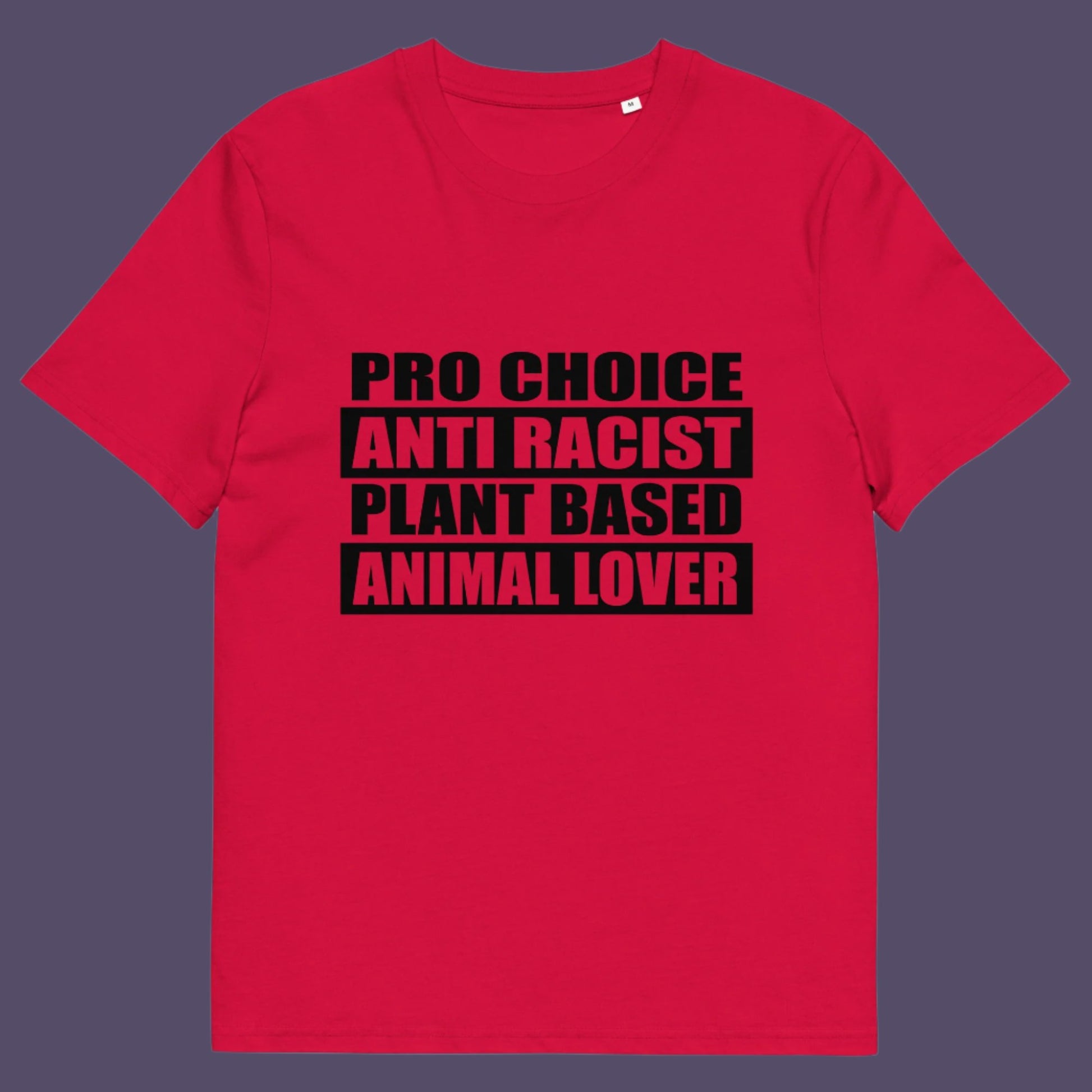 Red t-shirt. A plant based t-shirt design intertwined with Pro Choice, Anti Racism, and Animal loving, characteristics that often go together. Made from 100% organic ring-spun cotton, this vegan t-shirt is unisex, high-quality, super comfy, and best of all, eco-friendly.