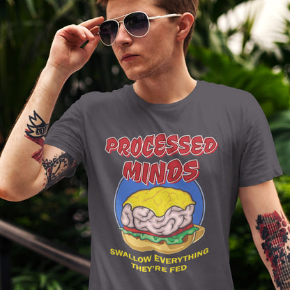 Person wearing a t-shirt with a graphic design and text, standing outdoors. This sign of the times t shirt design represents the amount of influence and mental manipulation in circulation these days. Resist the brainwashing and bring back wild and organic independent thinking. Made from 100% organic ring-spun cotton, these social issues t shirts are unisex, high-quality, super comfy, and best of all, eco-friendly.