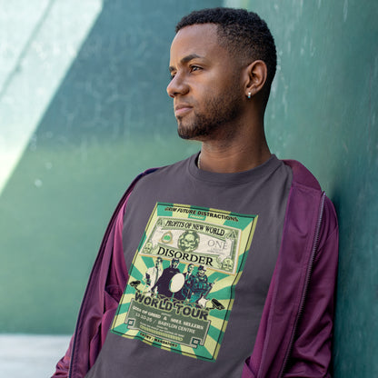 Man wearing an anthracite t-shirt with a band graphic and purple jacket against a green wall. A non conformist t shirt in the style of a band tour poster. This satirical t-shirt design highlights the forces that influence our society now, and for the foreseeable future. A spoof band t-shirt to create social awareness. Made from 100% organic ring-spun cotton, this anti government t shirt is unisex, high-quality, super comfy, and best of all, eco-friendly.